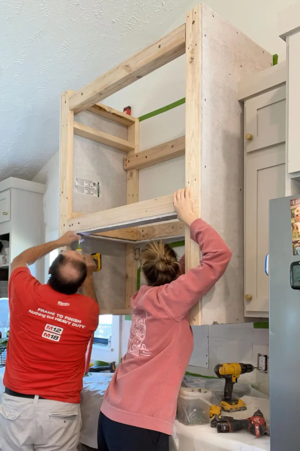 Adding cement board to DIY range hood.